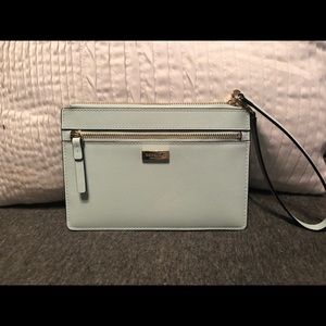 Beautiful blue Kate Spade wristlet.